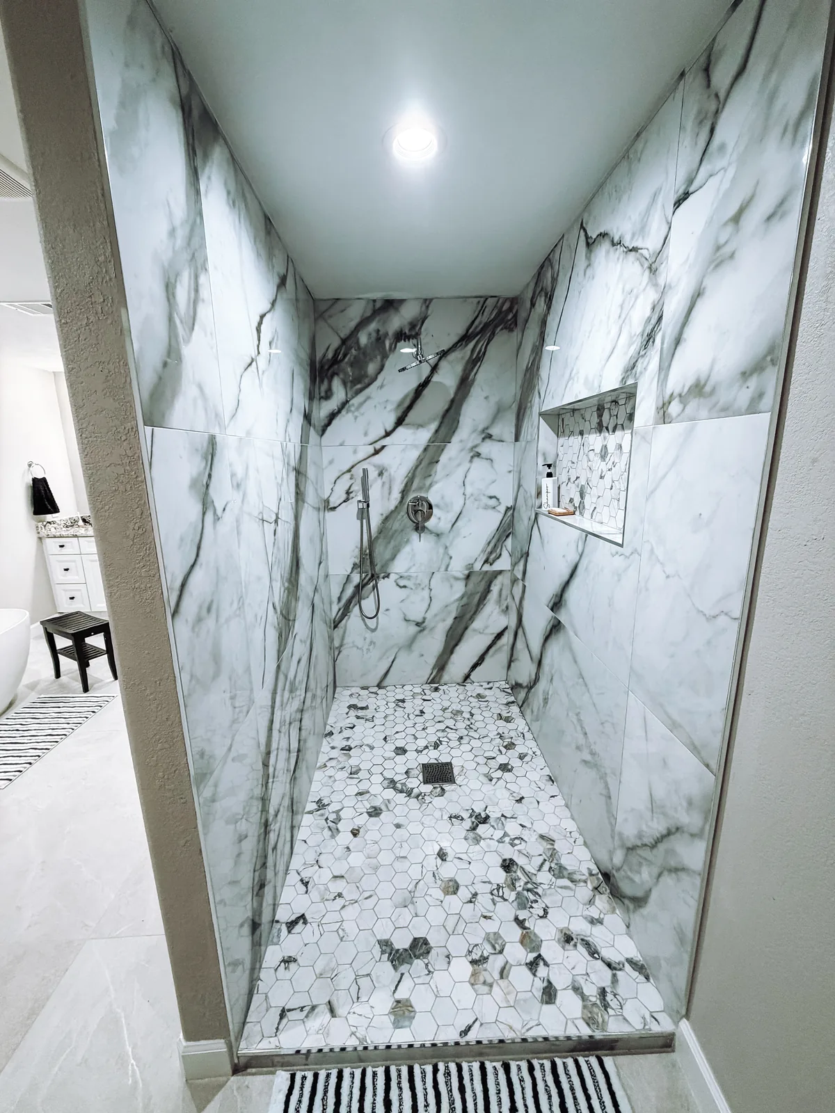 Spa-like master bathroom remodel with custom tile shower by Texan Home Additions in Manvel, TX