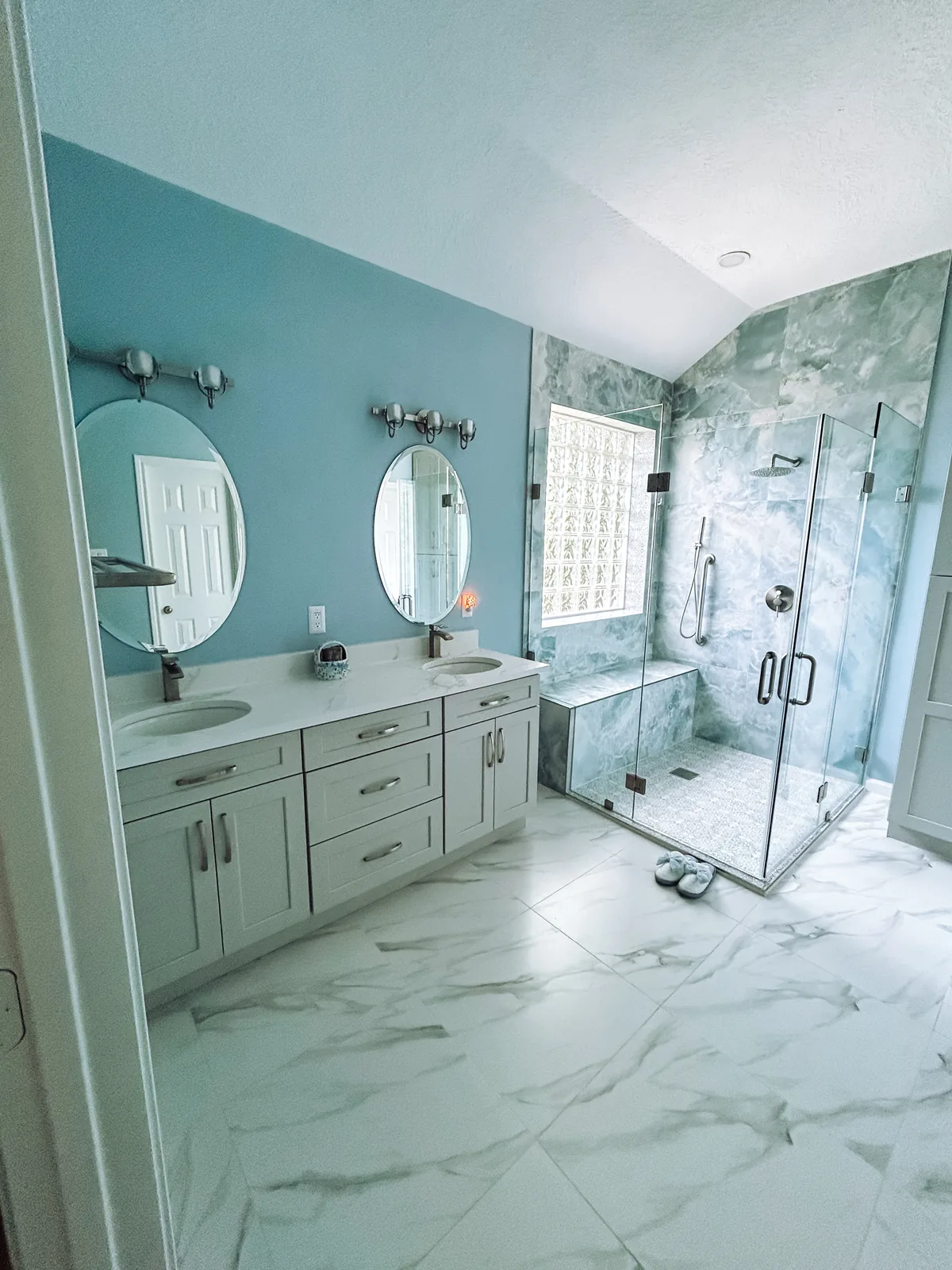 Glass-enclosed tile shower bathroom remodel near Manvel, TX
