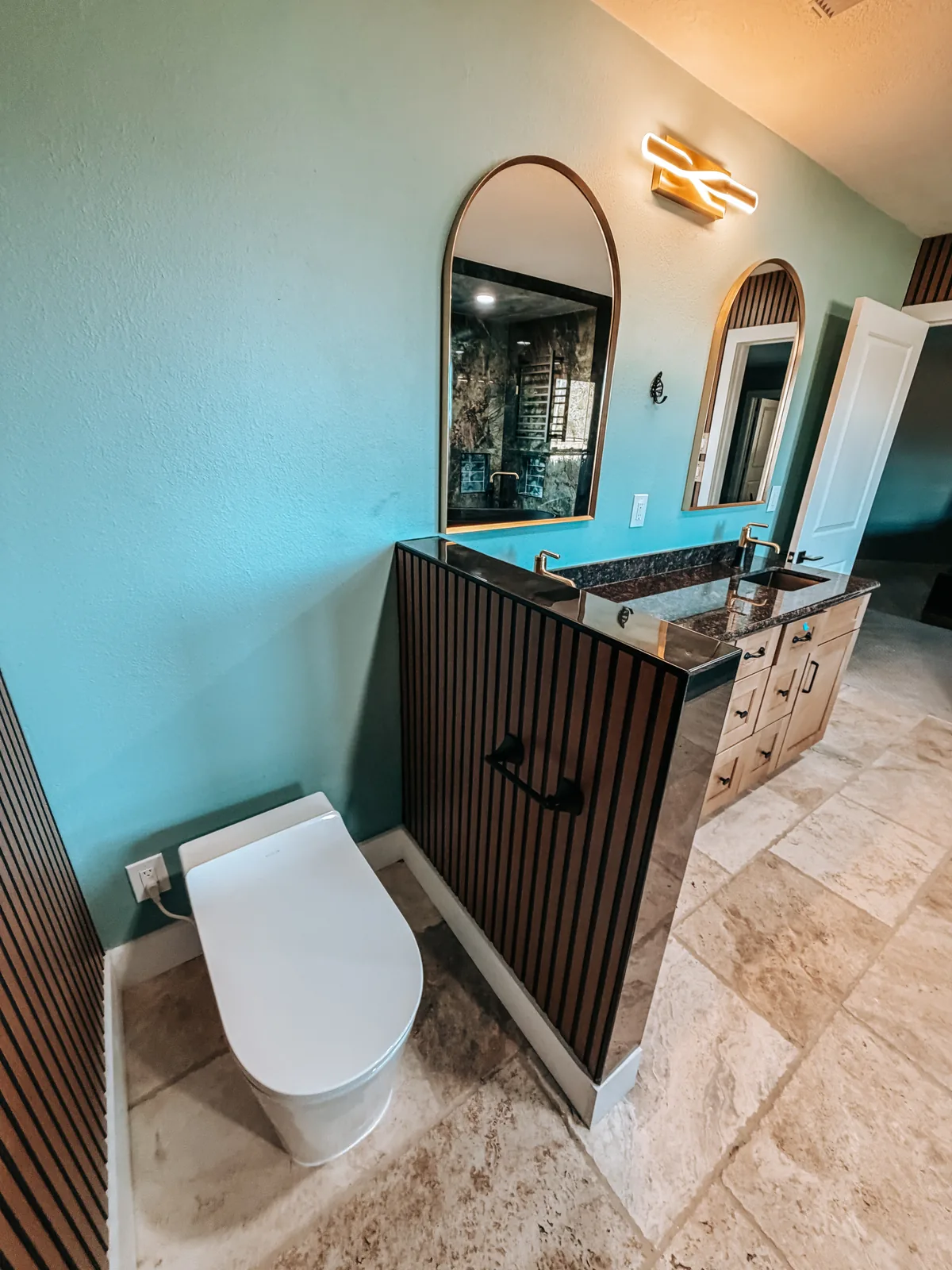 Elegant bathroom remodel with custom vanity and lighting, Houston area