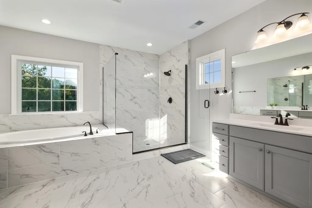 Bathroom remodeling contractor reviewing plans