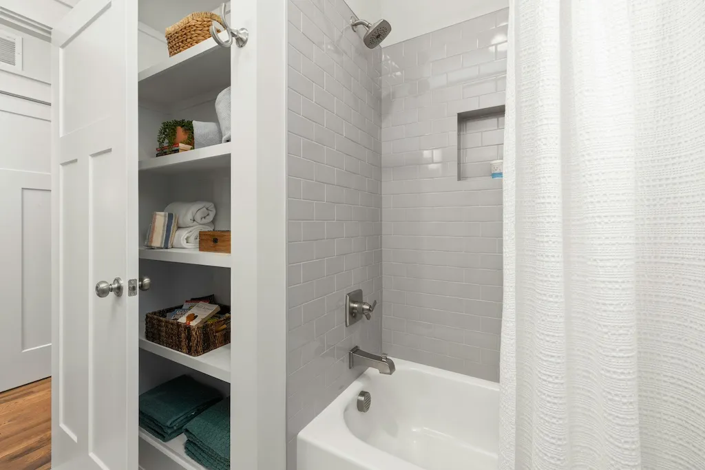 Styled bathroom shelves with decor