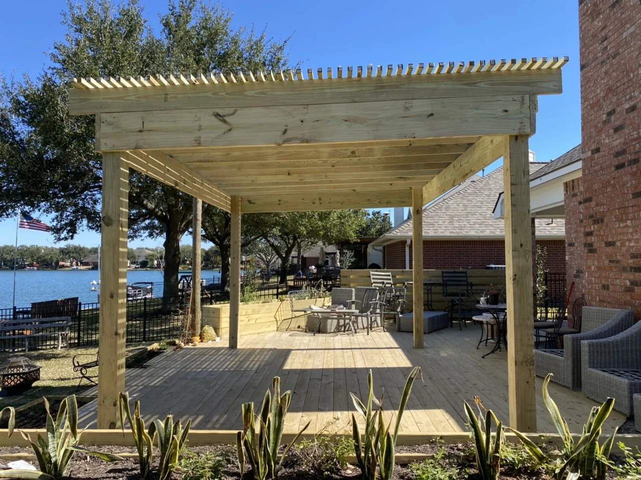 Custom-designed backyard outdoor living space in League City, TX by Texan Home Additions